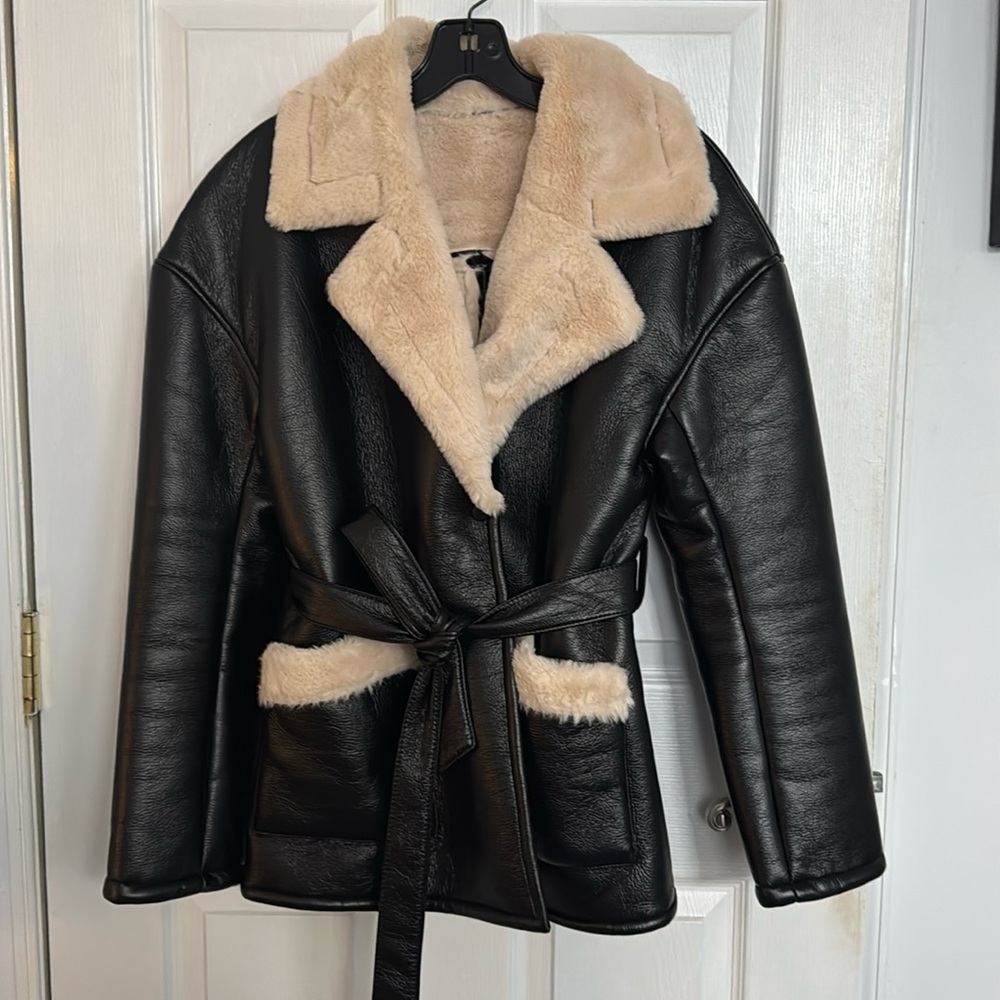 Black leather jacket with fur collar